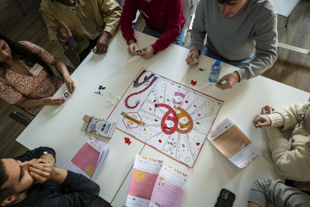 Workshop participants play the game
